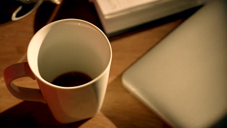 Pouring-black-coffee-to-the-cup