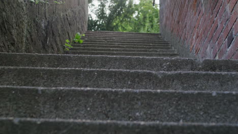 gimbal tracking shot of walking up some stone stairs in ulm