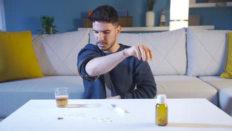 Addicted-man-shoots-with-heroin-syringe.