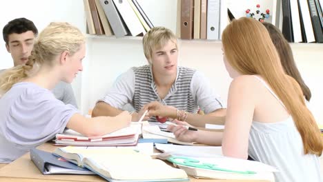 teenagers studying in the library