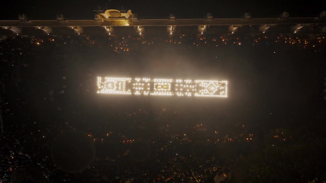 Top View Of Float Illuminated At Night During Religious Procession In Antigua, Guatemala - drone shot