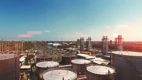 aerial view of petrol industrial zone, sun flare