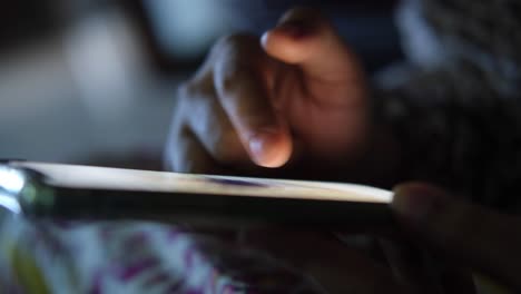 person using a smartphone at night