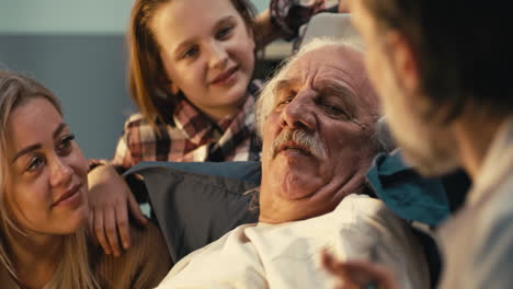 family visits elderly grandparent