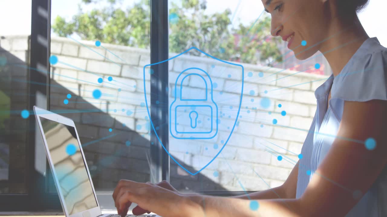 Animation of dots around padlock in shied over caucasian woman working on laptop