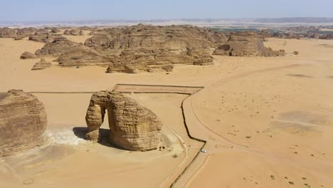 the elephant rock in al aula saudia arabia. a true icon of alula, the elephant shaped rock formation stretches up 52 metres into the sky, its warm-hued sandstone shaped by wind and water erosion.