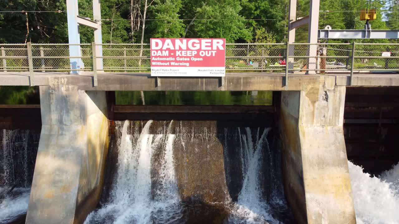Warning Sign At Dangerous Dam In Wasdell Falls Hydro Facility In Simcoe County, Ontario, Canada