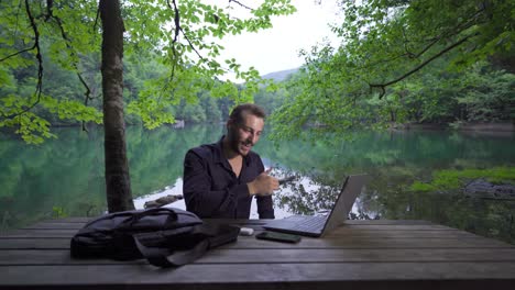 freelance businessman working in nature.