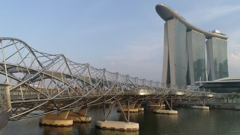 modern bridge and marina bay sands in singapore