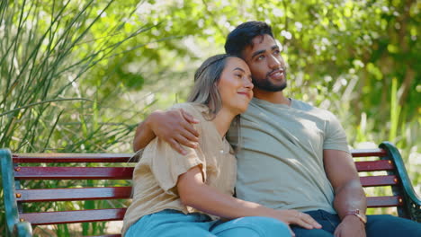 park, relax and happy interracial couple on bench