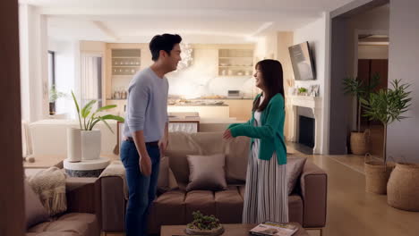joyful couple's embrace in a modern living room