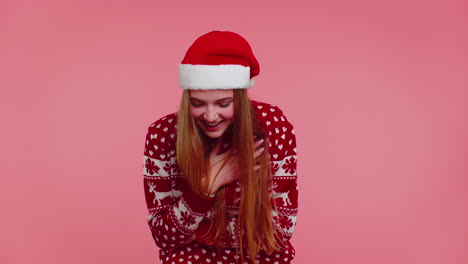 Lovely-positive-adult-girl-in-Christmas-sweater-laughing-out-loud-after-hearing-anecdote,-funny-joke