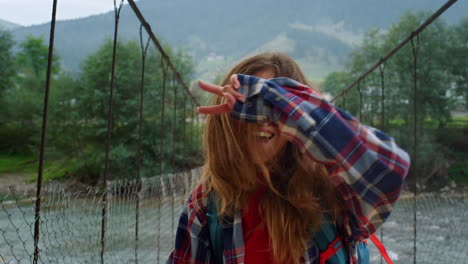 smiling woman enjoy nature inspiration outside. hiker dance on mountains view.
