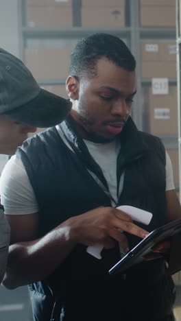 warehouse workers checking inventory