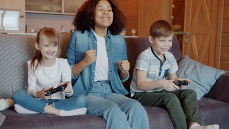 children playing video games together