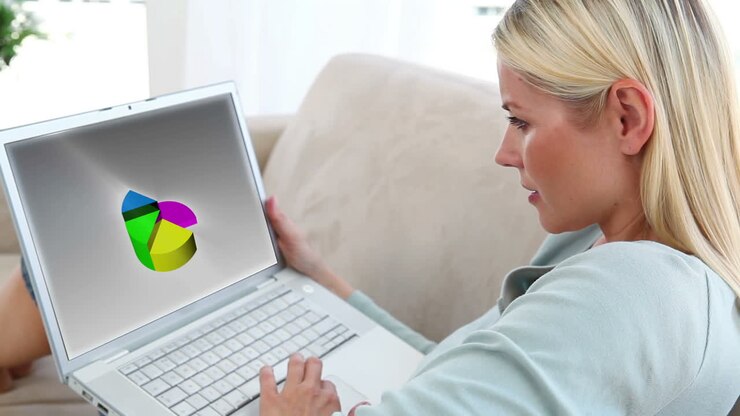 Videos of people doing charts a laptop in a living room