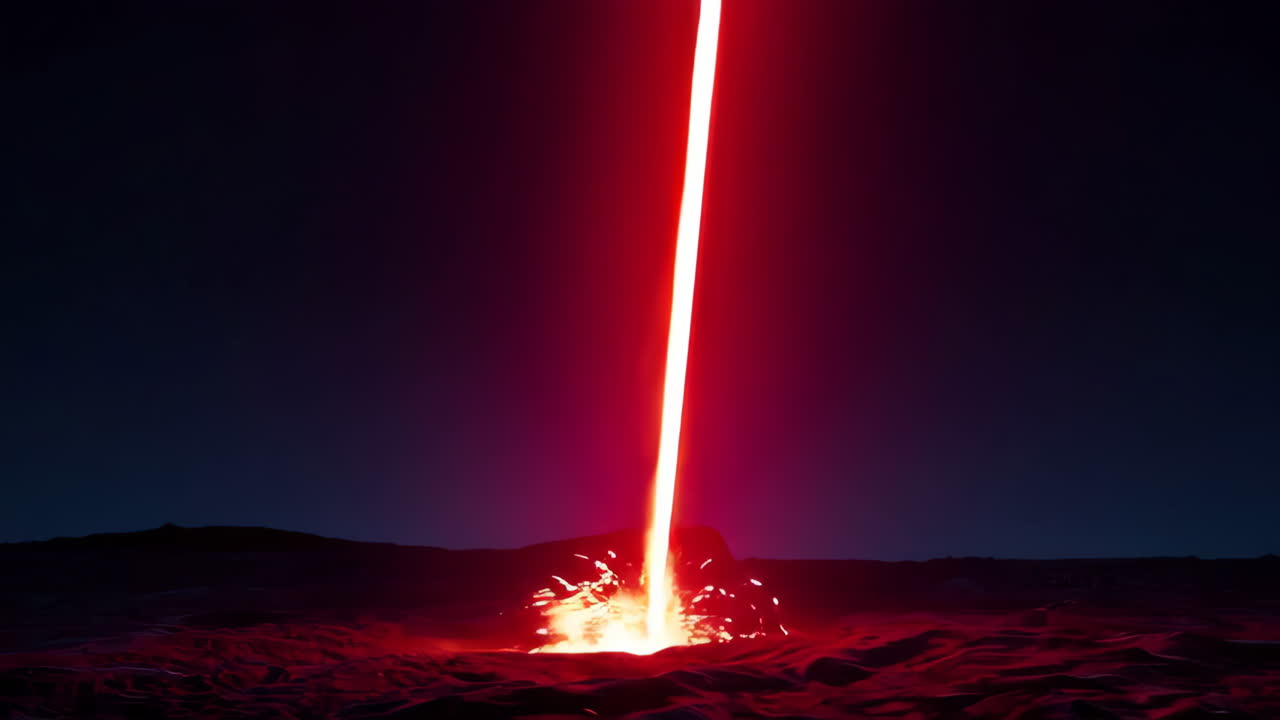 Red Laser Beam Impacting a Desert Landscape at Night