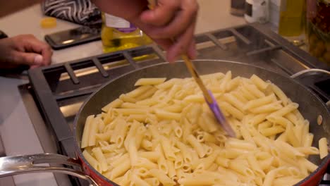 pasta being cooked in a pot