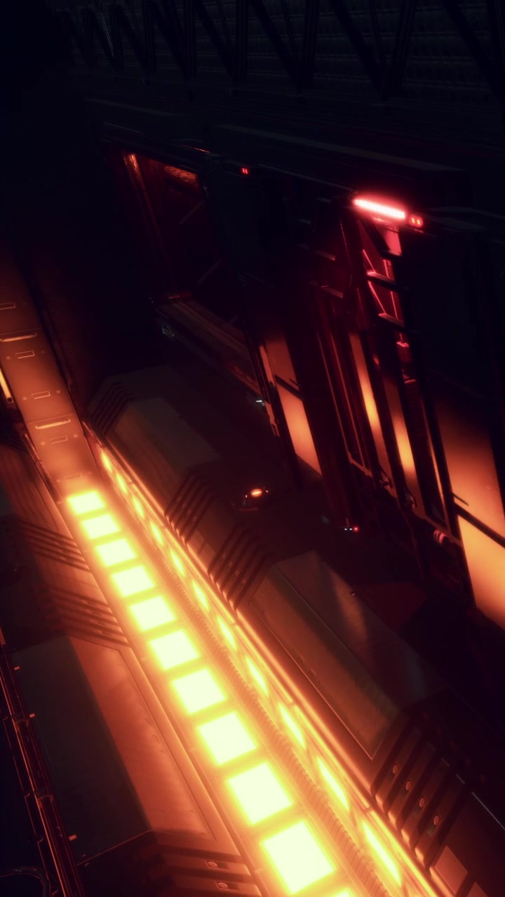 Vista di un ambiente industriale futuristico con luce arancione brillante di notte.