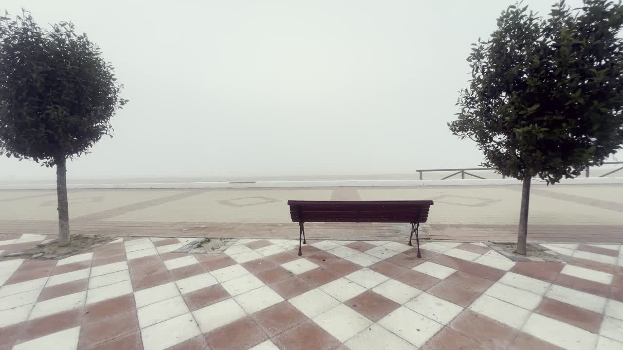 Passage along the promenade to the observation tower in the fog