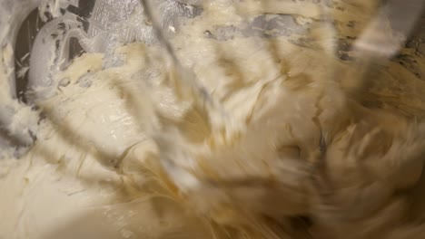 close up showing the detail of sweetened condensed milk being shipped with butter