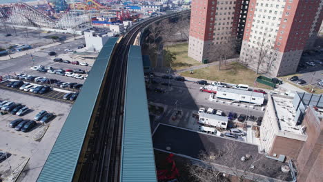 aerial view of modern train at west 8th street, near new york aquarium, usa