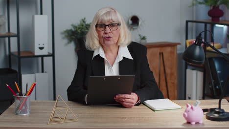 senior business woman director having interview job discussion, video conference call at home office