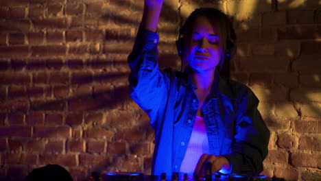 woman djing at the disco