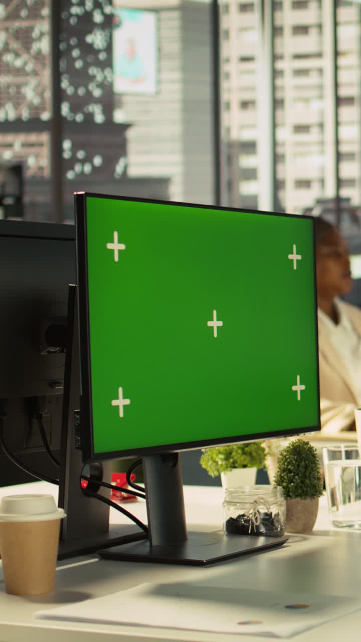 Vertical video Employee at work having trouble with broken keyboard while using green screen PC