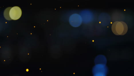 partículas brillantes y luces bokeh animación sobre fondo oscuro