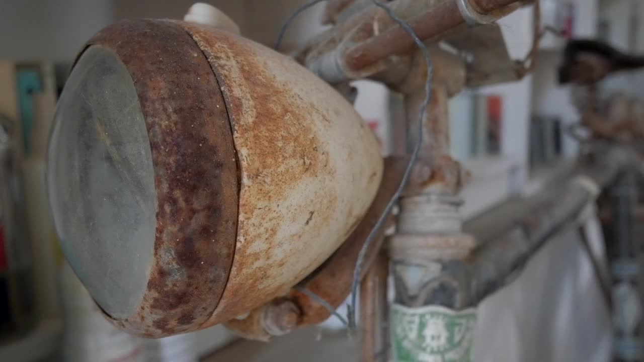 Rustic bicycle headlight evokes nostalgia and vintage charm