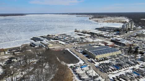 aerial push over the various docks and marinas on muskegon lake