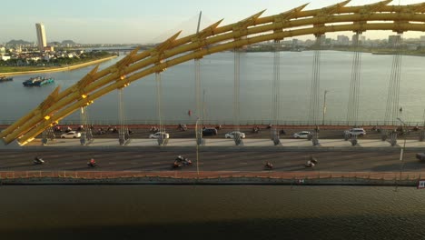 An-aerial-shot-over-the-famous-dragon-bridge-with-heavy-traffic-on-the-road