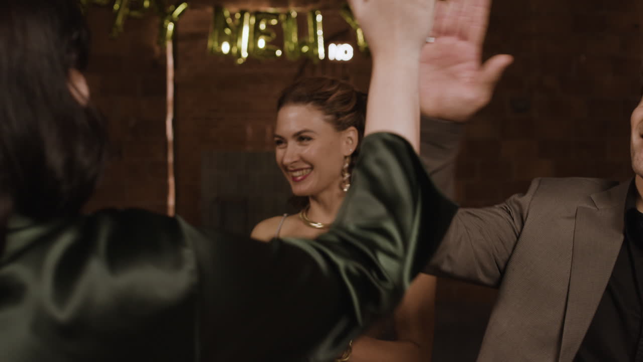 Group of friends celebrating and having fun at a party