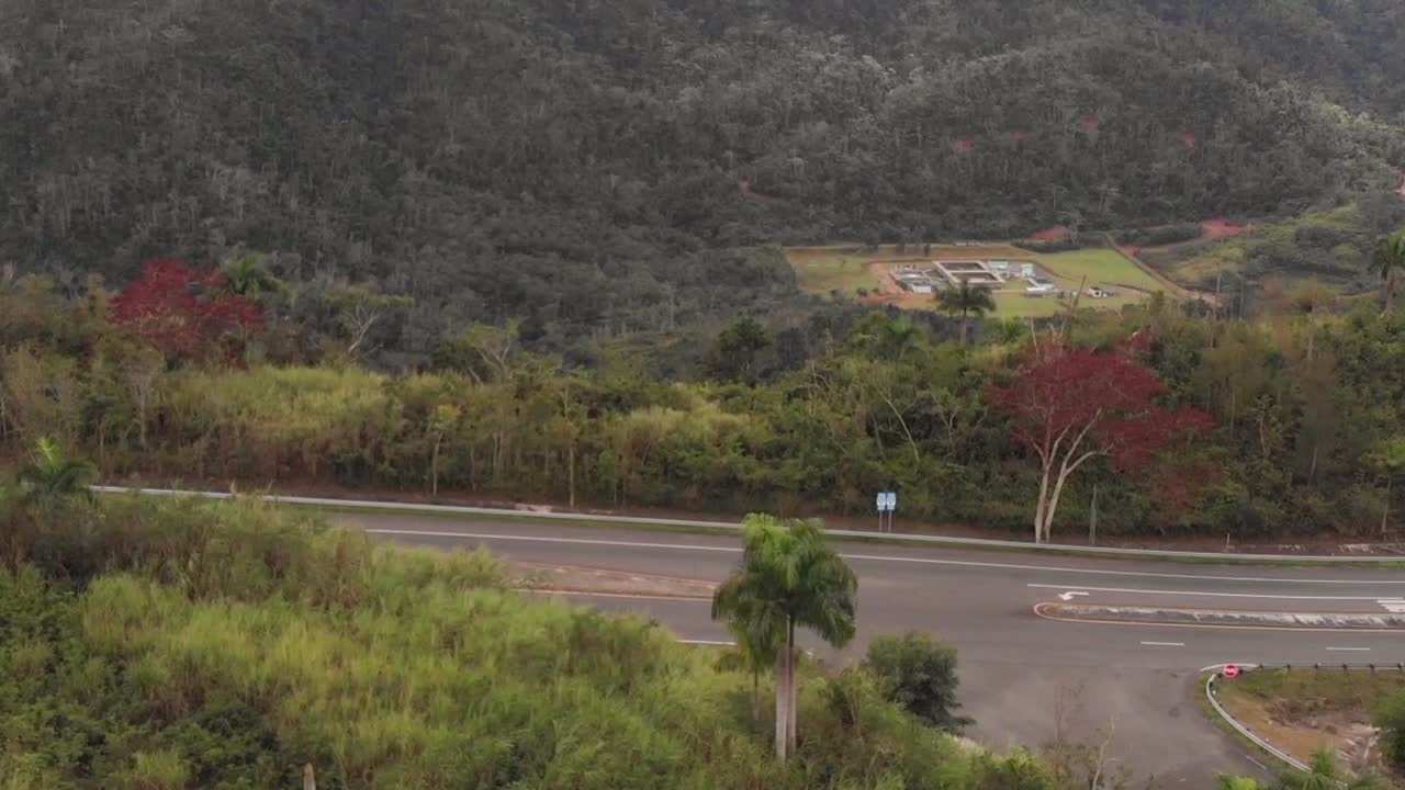Aerial Shot on the mountains revealing the river.