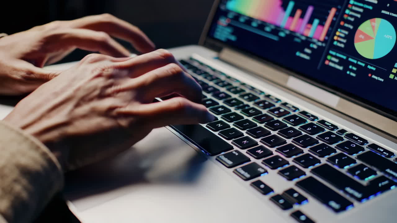 Person working on a laptop at night