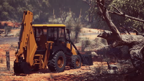 excavator tractor in bush forest