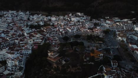 iconic white color township of mijas in spain, aerial drone view