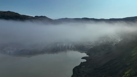 Aerial-view-of-Low-cloud-next-to-Solheimajokull-Glacier-in-South-Iceland