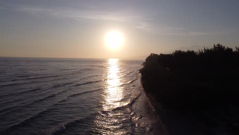 golden sunset over a tropical coastline