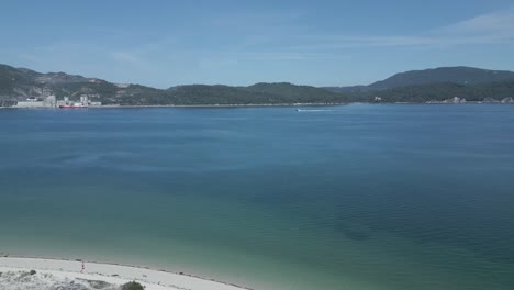 Aerial-view-of-Arrabida-on-a-sunny-day-with-a-blue-sea-in-Portugal