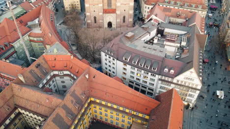 revealing aerial of the munich frauenkirche, or the cathedral of our dear lady, a prominent landmark and iconic symbol of munich, germany