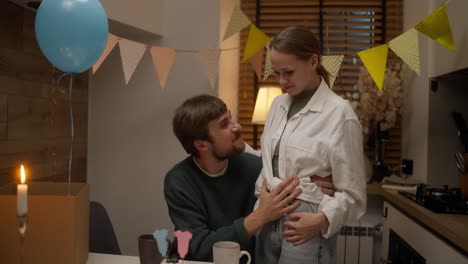 couple celebrating a birthday at home