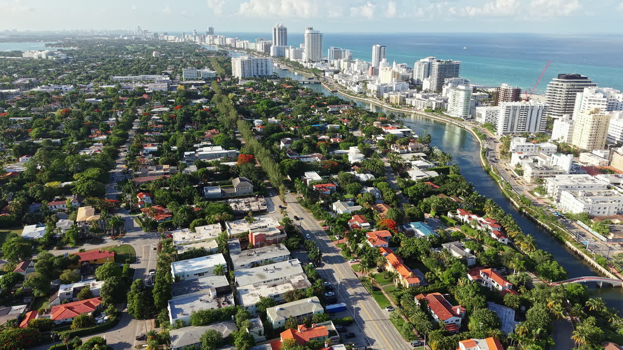 Revealing Drone Shot of Miami Beach, Florida USA, Bayshore Neighborhood and Beachfront Buildings