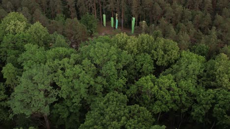 An-aerial-view-of-Valmiera-city,-showcasing-its-blend-of-urban-and-natural-elements