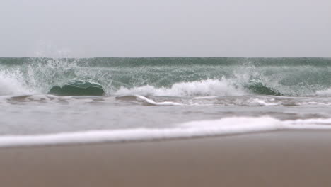 waves crashing on the beach