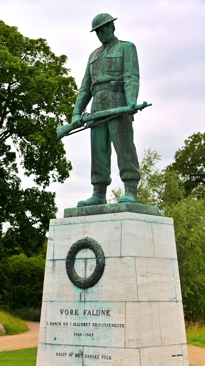 Our Fallen sculpture at the entrance to the Citadel in Copenhagen, Denmark. Vertical