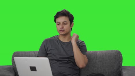 Indian-man-talking-on-video-call-Green-screen