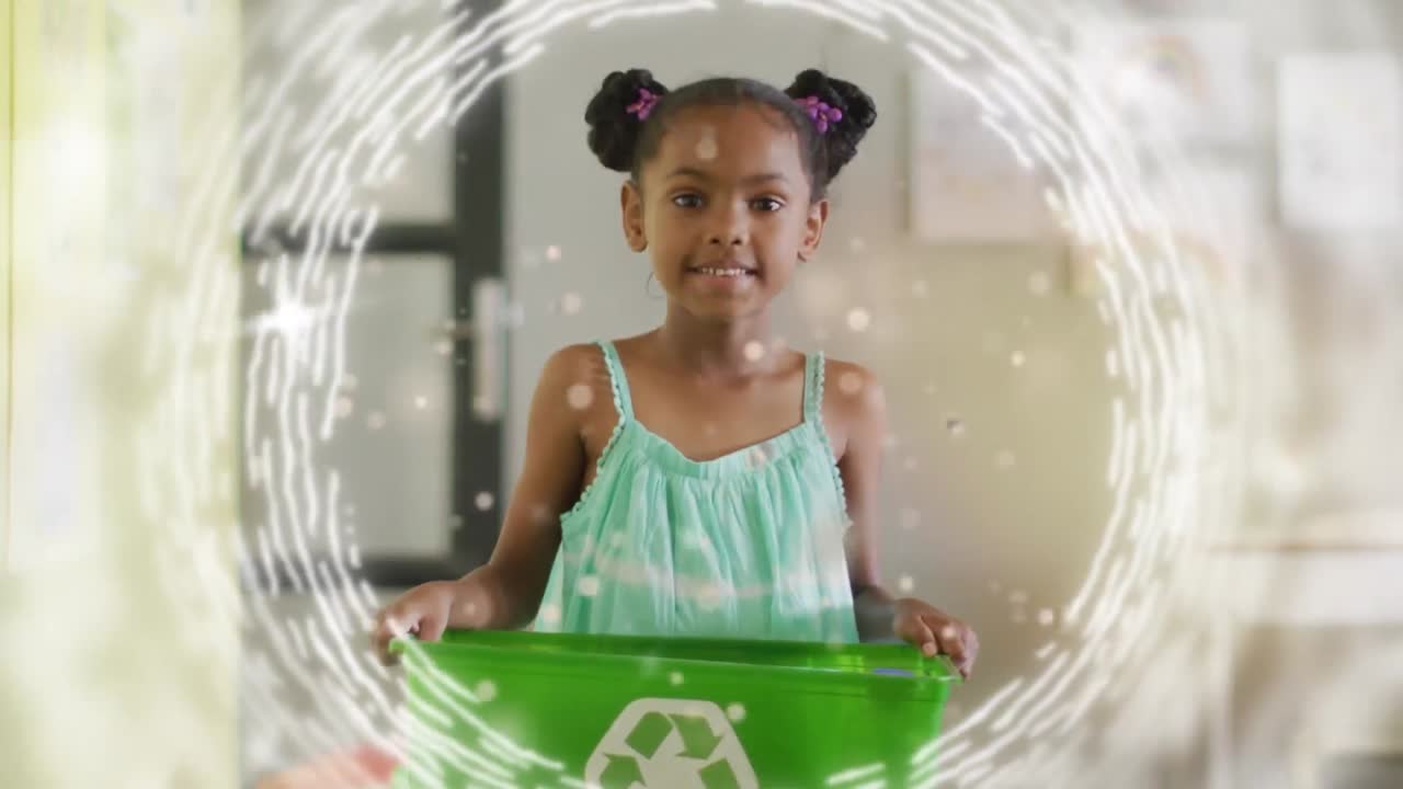 Animation of data loading over happy biracial girl recycling plastic in classroom