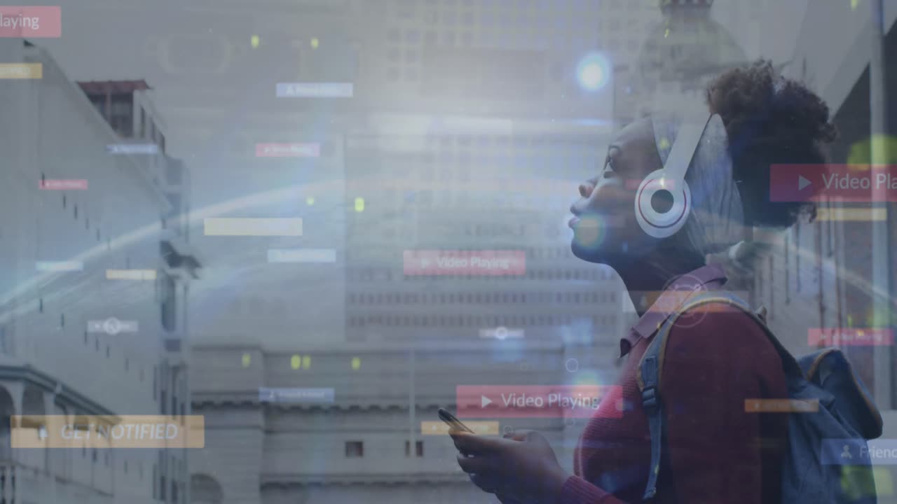 Animation of media icons over african american woman using smartphone